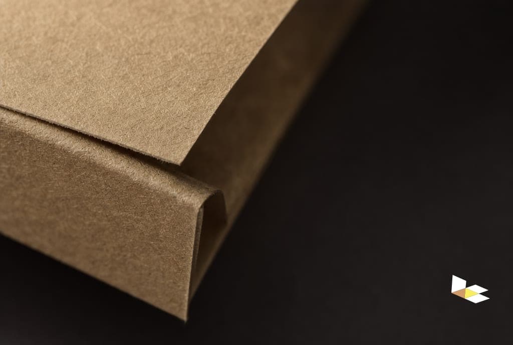 Macro view of recycled kraft board texture and seal